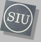 close up of silk screened logo on hand painted sign